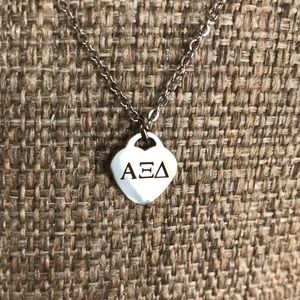 A Xi D Necklace 💙💛